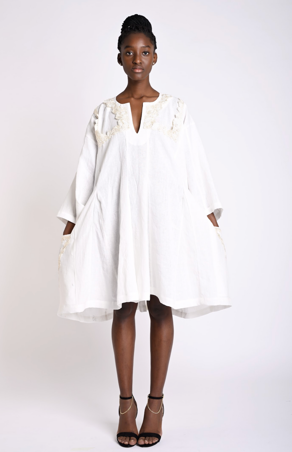 Flowy knee-length dress with embroidered details