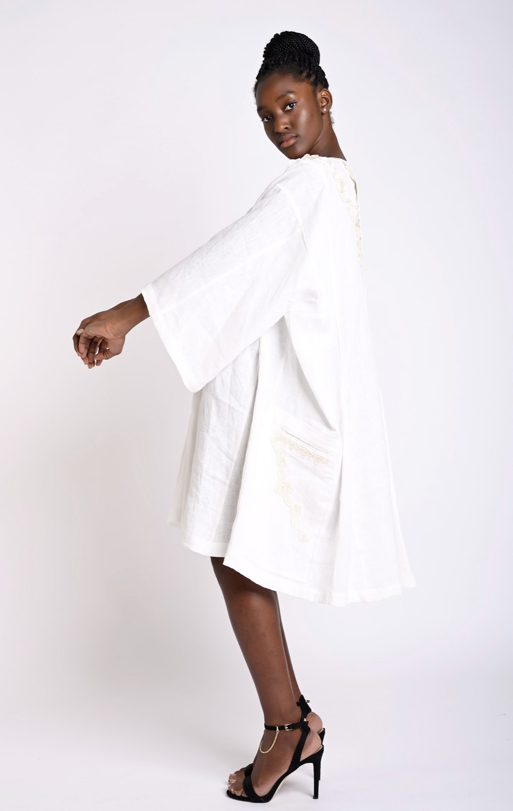 Flowy knee-length dress with embroidered details