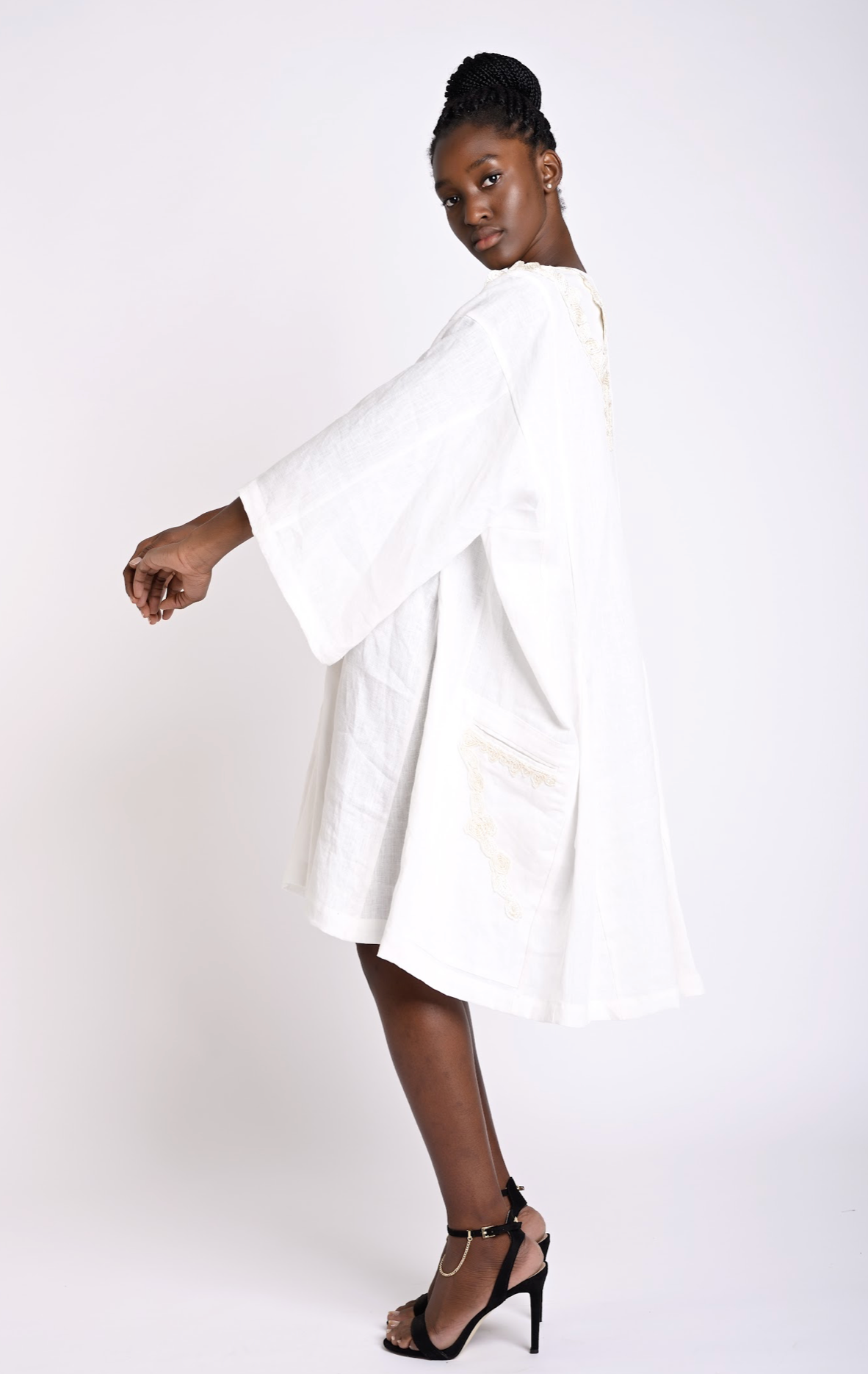 Flowy knee-length dress with embroidered details